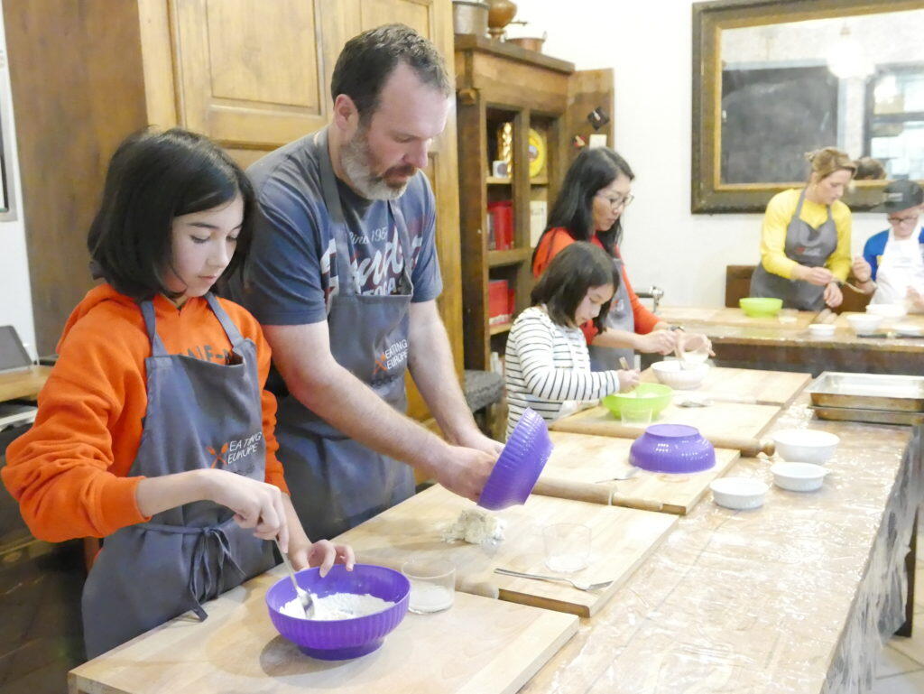 Group of people cooking in a workshop