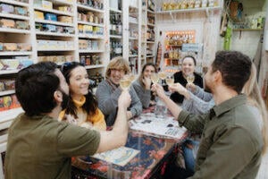 group_of_people_eating_at_Mercearia_do_Pai_Júlio_Lisbon