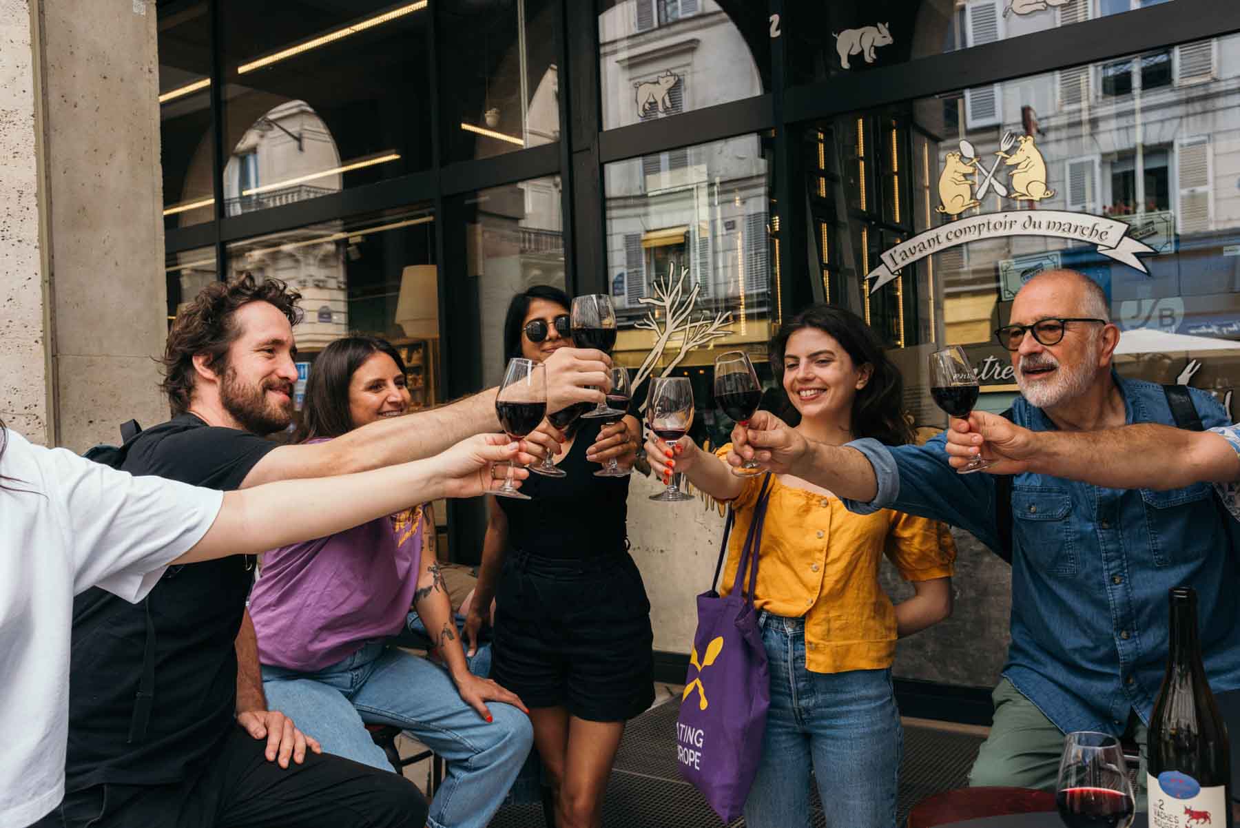 group_drinking_wine_on_Eating_Europe_tour_at_LAvant_Comptoir_du_Marche_Paris