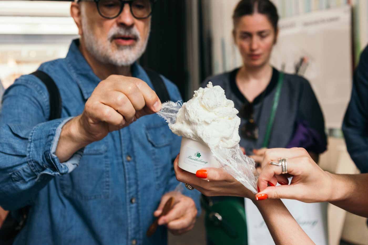 group_eating_cheese_at_Fromagerie_Barthélemy_Paris